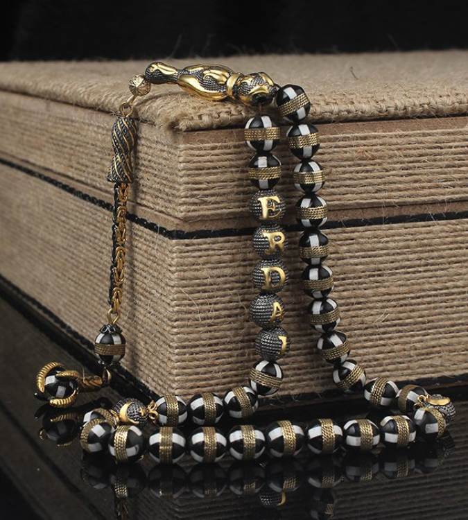  سبحة من الكوك  مطلية بالفضة مع (اسم حسب الرغبة)